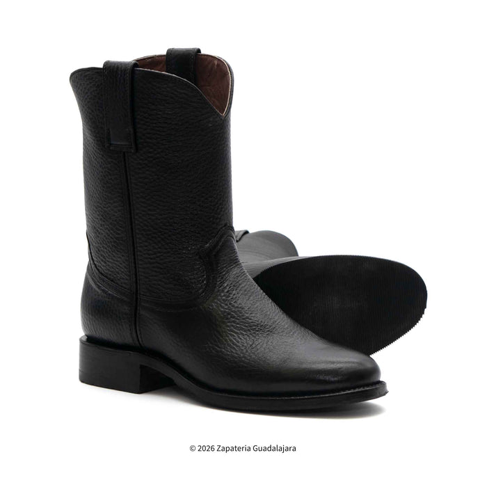 Black leather boots on a white background