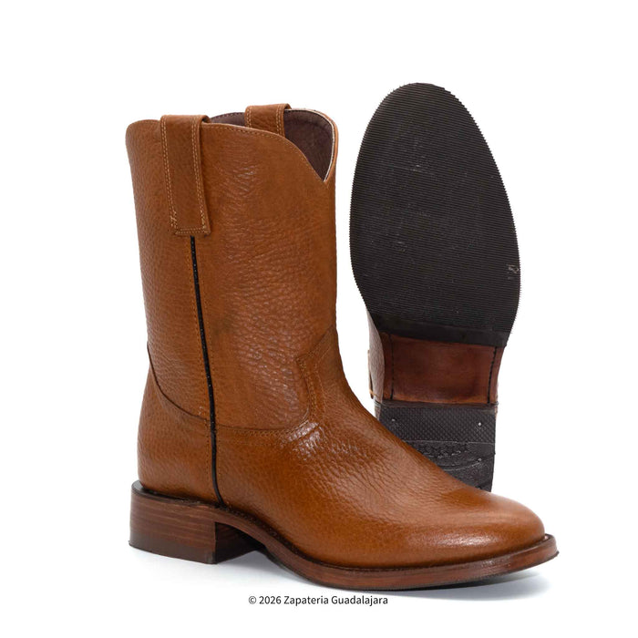 Brown leather boot with a black sole on a white background