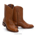 Pair of brown leather boots on a white background