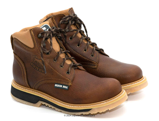 A pair of brown leather work boots with a non-slip sole and lace-up closure. The boots have a double density construction designed for durability.