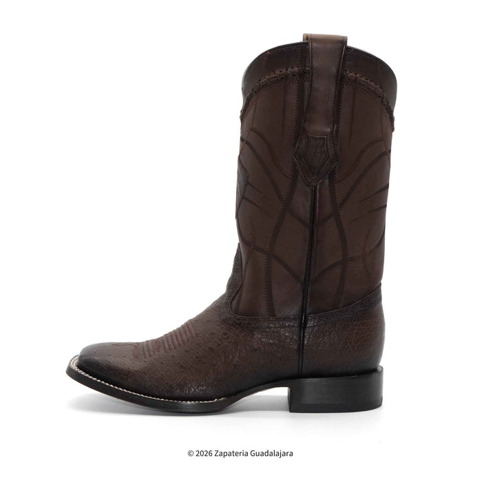 A single dark brown western cowboy boot with a textured alligator or python-style toe and upper shaft, shown in profile against a white background.