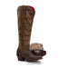 Brown cowboy boot with intricate patterns on a white background