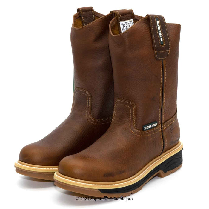 Pair of brown leather boots on a white background