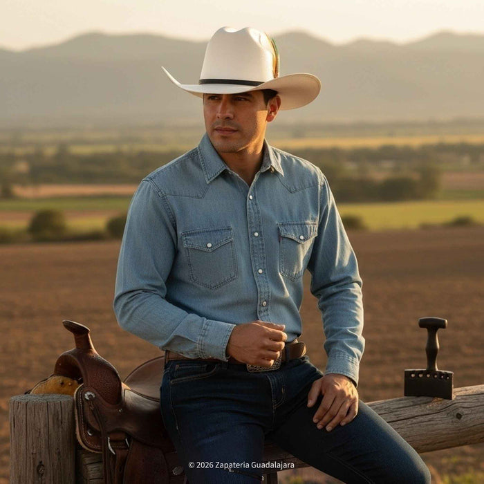 cowboy wearing TOMBSTONE 1000X TELAR CHAPARRAL BLACK BELT hat