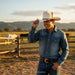 cowboy wearing TOMBSTONE 1000X TELAR CHAPARRAL BLACK BELT hat