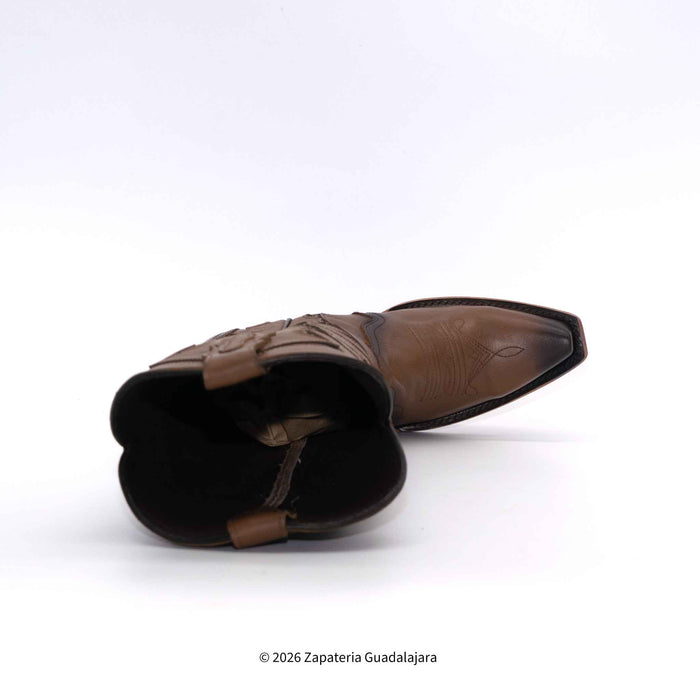 Brown leather boot with detailed design on a white background