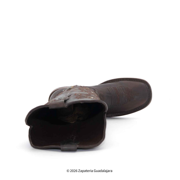 Brown cowboy boot on a white background