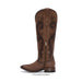 Brown cowboy boot with intricate designs on a white background