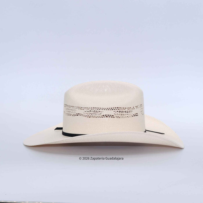 Beige cowboy hat with a black band on a light gray background
