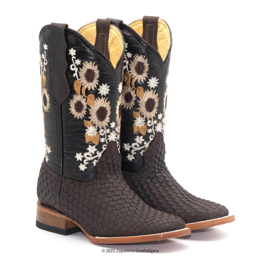 A pair of women's brown leather boots with a floral petatillo pattern and embroidery on the shaft, a square toe, and a 1.5 inch heel.
