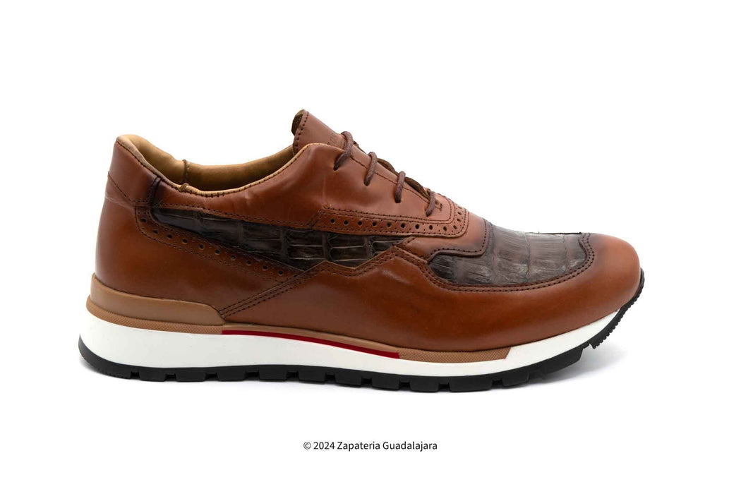 Brown leather sneaker with a white sole on a white background
