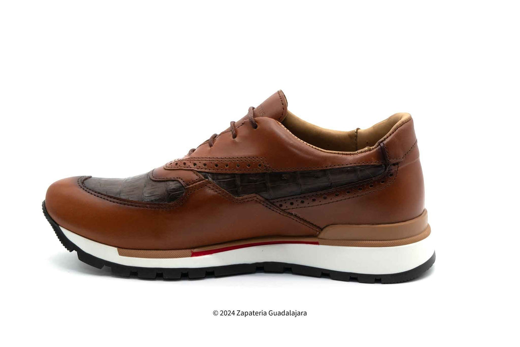 Brown leather shoe with white sole on a white background
