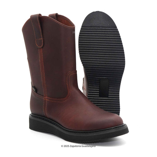 Brown leather boot with black sole on a white background