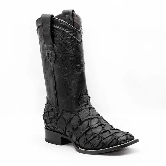 A pair of men's black matte leather boots with a wide square toe and unique exotic leather texture.