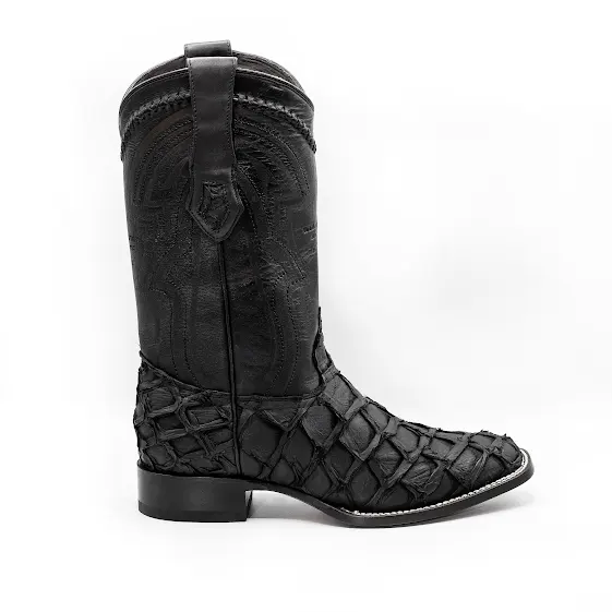 A black matte finish boot with a unique geometric patterned skin texture, likely made from Pirarucu leather, with a square toe and a pull tab on the back.