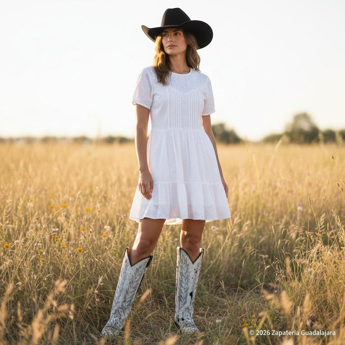 Zapateria Guadalajara tall cow hair leather boots with square toe, 17" shaft, and 1.5" heel. Unique black and white pattern.