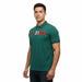 Zapateria Guadalajara green cotton-polyester blend polo shirt with red MEXICO embroidery and patterned collar and cuffs.