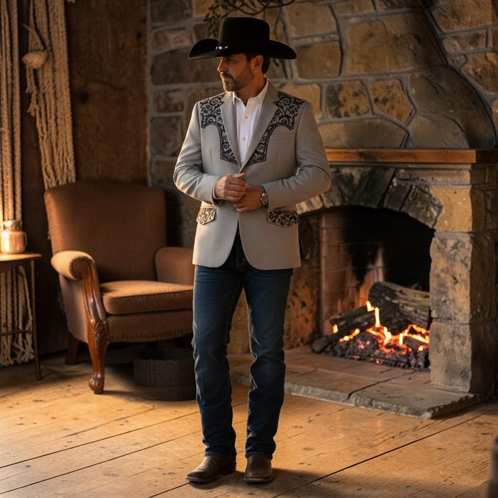 Zapateria Guadalajara grey suede western blazer with black embroidered details on collar and pockets. Two-button closure.