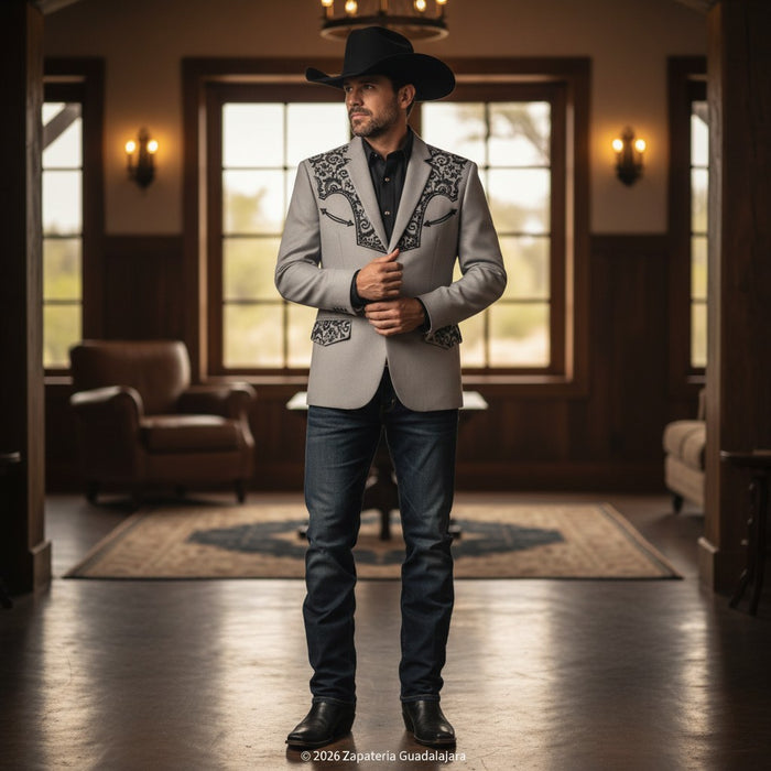 Zapateria Guadalajara grey suede western blazer with black embroidered details on collar and pockets. Two-button closure.